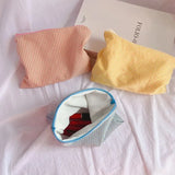 A women's plaid cosmetic bag, large capacity cotton, suitable for travel, make-up