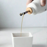 Ceramic Oil Bottle Pot Soy Sauce Vinegar Leakproof Bottle Condiment Jar Creative Metal spout spice bottle‌ condiment dispenser