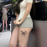 French Ribbon Bow Tattoo Sticker: herbal juice sensual design for neck scar cover. Vivid semi-permanent realistic art.