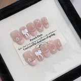 10Pcs Cute Cat Eye Almond Fake Nail Blue Shiny with Small Rhinestone Nail Art Nude Color Short Oval Finished Artificial Manicure
