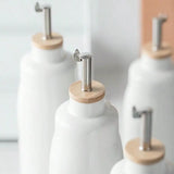 Ceramic Oil Bottle Pot Soy Sauce Vinegar Leakproof Bottle Condiment Jar Creative Metal spout spice bottle‌ condiment dispenser