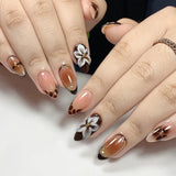 24Pcs Zebra Stripe Press on Nails Dark Brown with Gold Beads Fake Nails Almond Shape Nail Art French Style False Nails for Fall