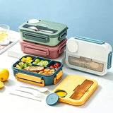 Student and office worker-friendly compartmentalized lunch box with fork and spoon, suitable for microwave use